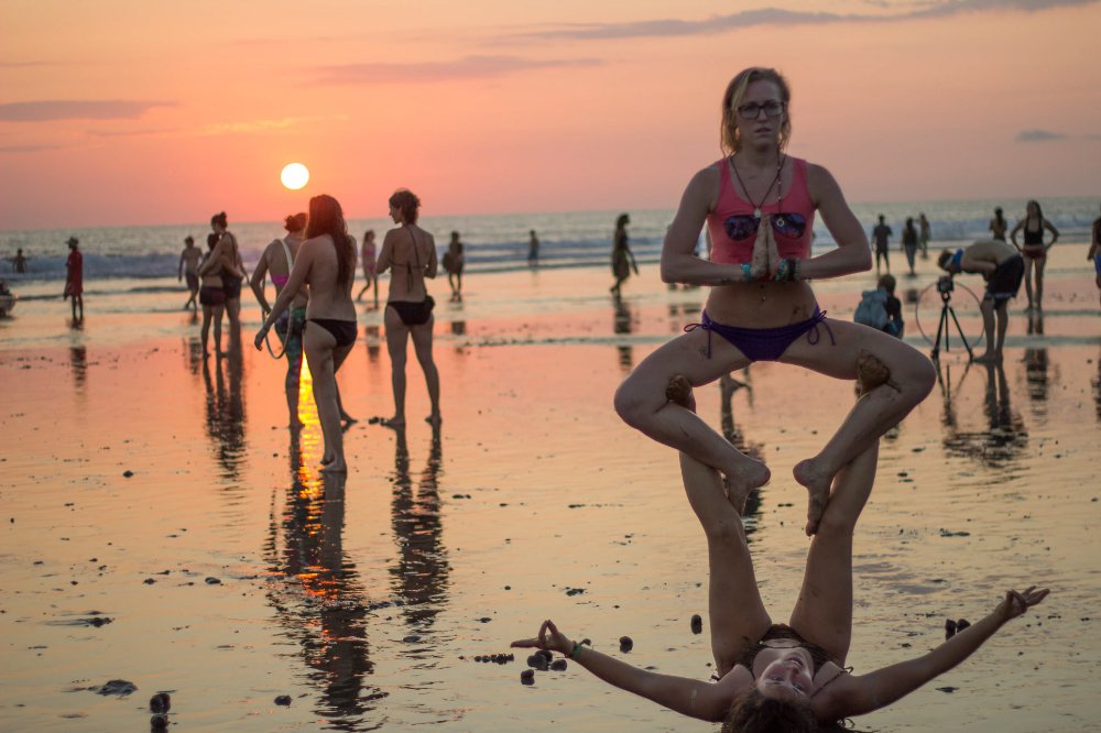 acro yoga on the beach envision festival costa rica
 - Costa Rica