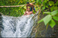        Man About To Slide On Uvita Waterfall Waterfall Tour Manuel Antonio
  - Costa Rica