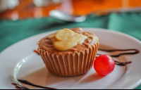        chocolate peanut butter cupcake closeup 
  - Costa Rica