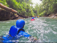        Wading In The Blue River To Get Inner Tube Rincon De La Vieja
  - Costa Rica