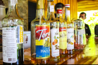        Drake Cafe Licor Syrup Bottle Display
  - Costa Rica